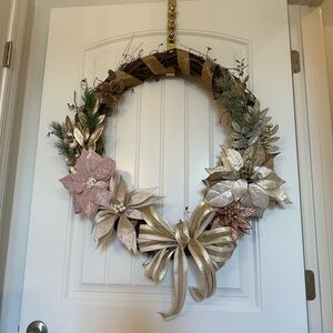 Elegant Holiday Wreath with Gold and Pink Accents